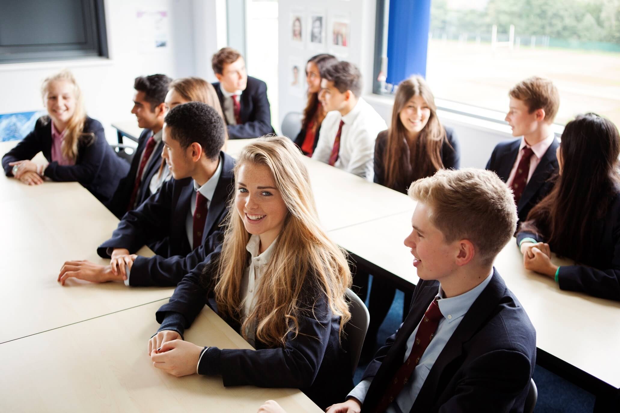 Teenage schoolchildren in class